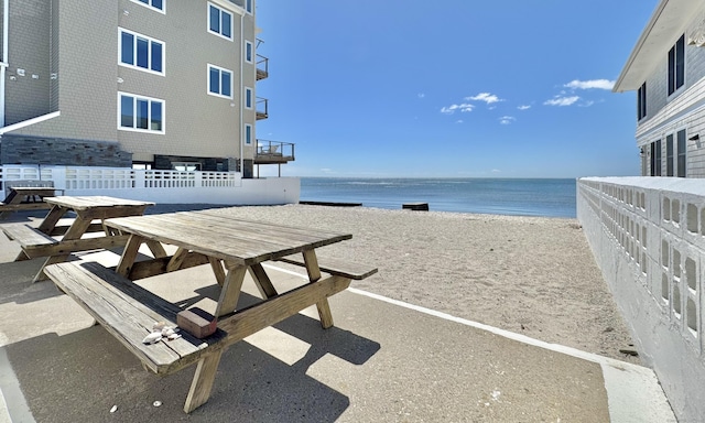 32 Lawrence Ave, Milford, CT 06460 - view of home's community featuring outdoor dining area and view of water and beach