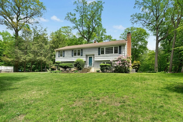 382 Nichols Ave, Shelton, CT 06484 - raised ranch with a chimney and a front yard