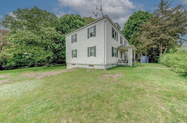 9 Jennings St, Griswold, CT 06351 - view of home's exterior featuring a yard