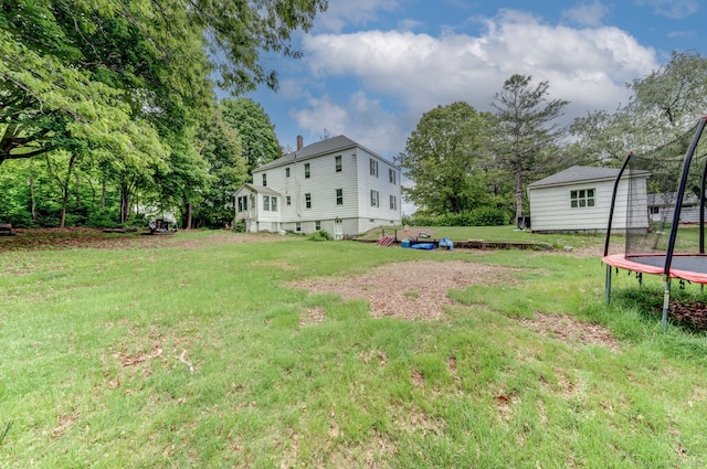 9 Jennings St, Griswold, CT 06351 - view of green lawn featuring a trampoline