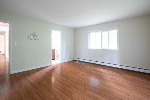 21 Elizabeth St, Trumbull, CT 06611 - unfurnished room featuring a baseboard radiator, wood finished floors, and baseboards