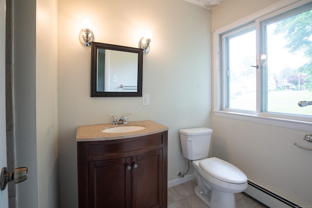 21 Elizabeth St, Trumbull, CT 06611 - bathroom featuring a baseboard heating unit, vanity, toilet, tile patterned floors, and baseboards