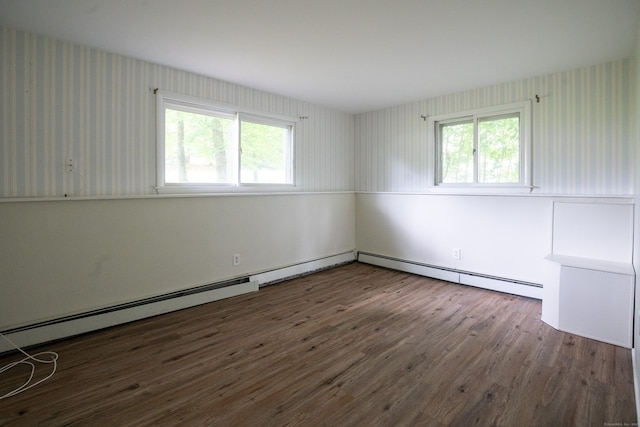 21 Elizabeth St, Trumbull, CT 06611 - empty room featuring healthy amount of natural light, dark wood-style floors, and wallpapered walls