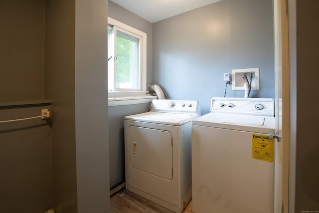 21 Elizabeth St, Trumbull, CT 06611 - laundry room featuring washing machine and dryer and wood finished floors