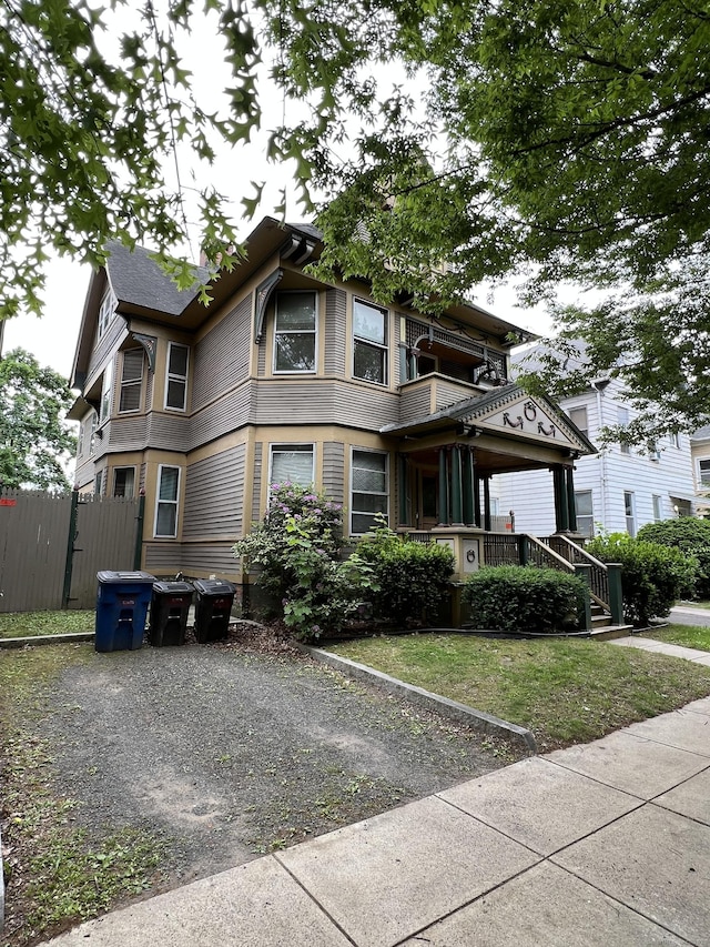868 Elm St, New Haven, CT 06511 - victorian house with gravel driveway and a balcony