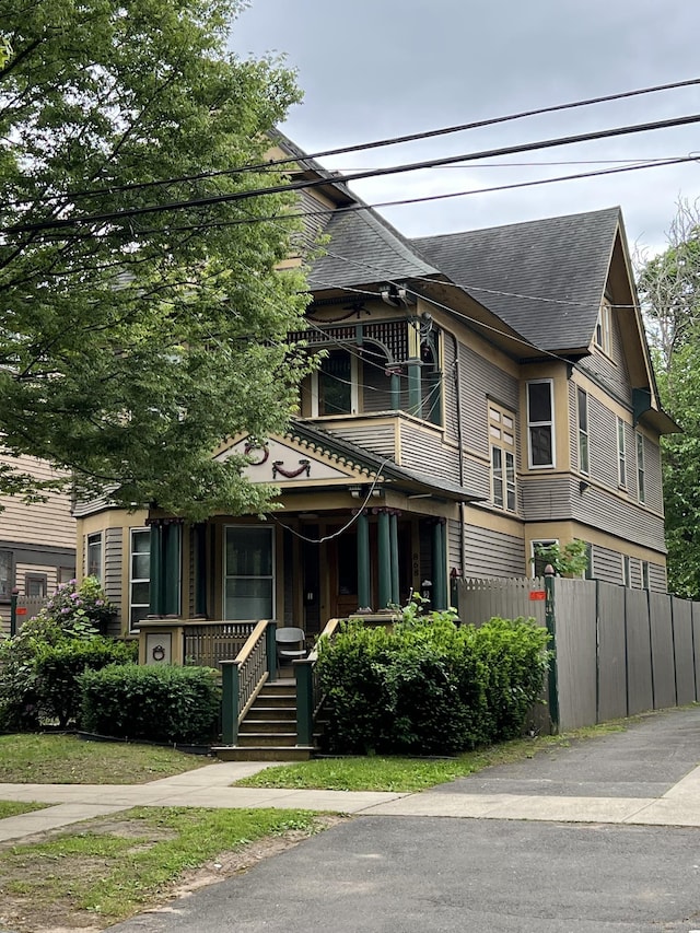 868 Elm St, New Haven, CT 06511 - victorian house with covered porch and a shingled roof