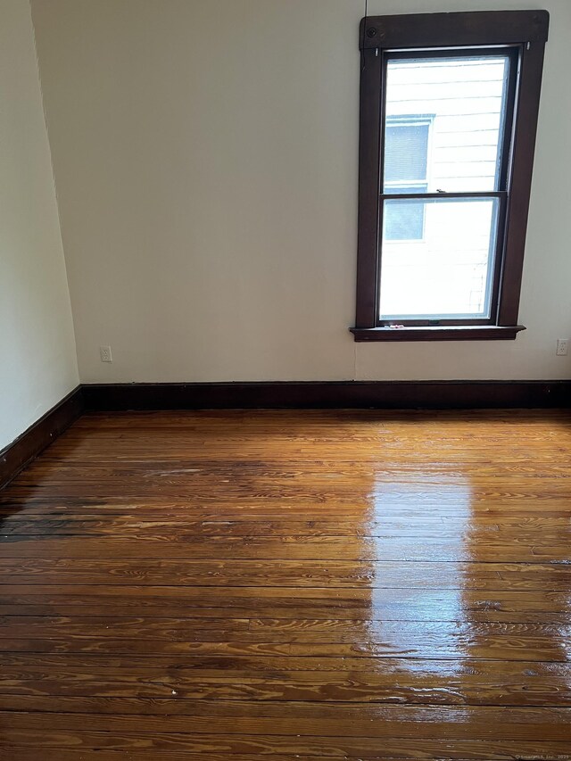 868 Elm St, New Haven, CT 06511 - spare room with dark wood finished floors and baseboards