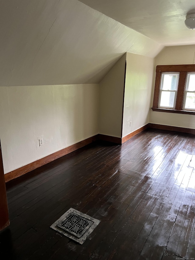 868 Elm St, New Haven, CT 06511 - bonus room with lofted ceiling, dark wood-style floors, and baseboards