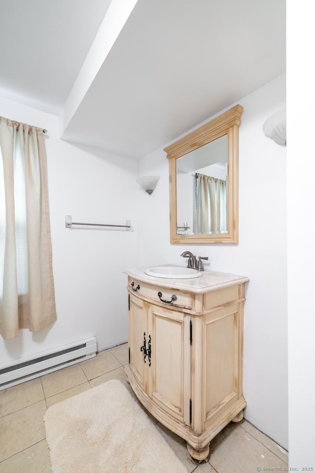 510 S St S, Bristol, CT 06010 - full bath featuring baseboard heating, vanity, and tile patterned floors