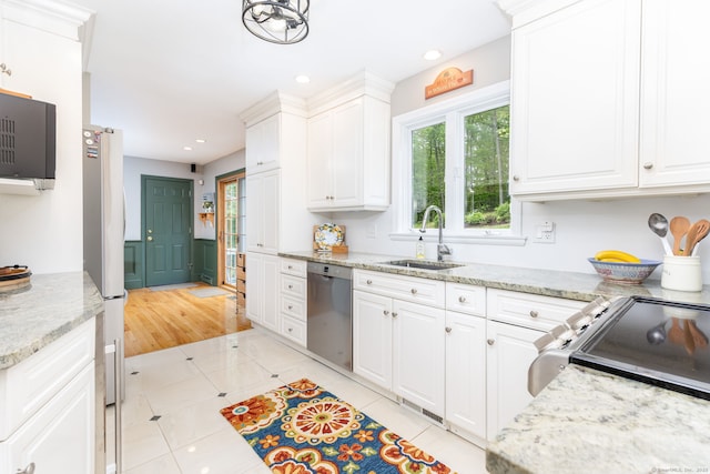 16 Darley Dr, Hamden, CT 06518 - kitchen featuring appliances with stainless steel finishes, a sink, healthy amount of natural light, white cabinets, and recessed lighting