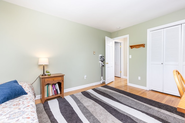 16 Darley Dr, Hamden, CT 06518 - bedroom with wood finished floors, baseboards, and a closet