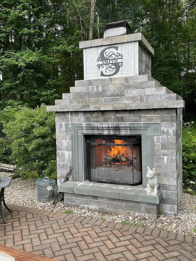 16 Jeremy River Dr, Colchester, CT 06415 - detailed view of a lit fireplace