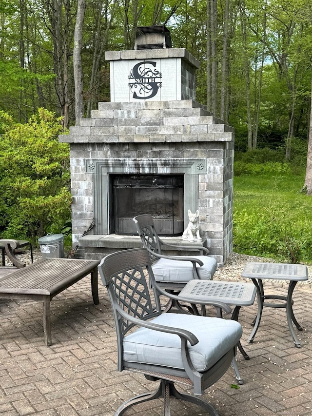 16 Jeremy River Dr, Colchester, CT 06415 - view of patio with an outdoor fireplace