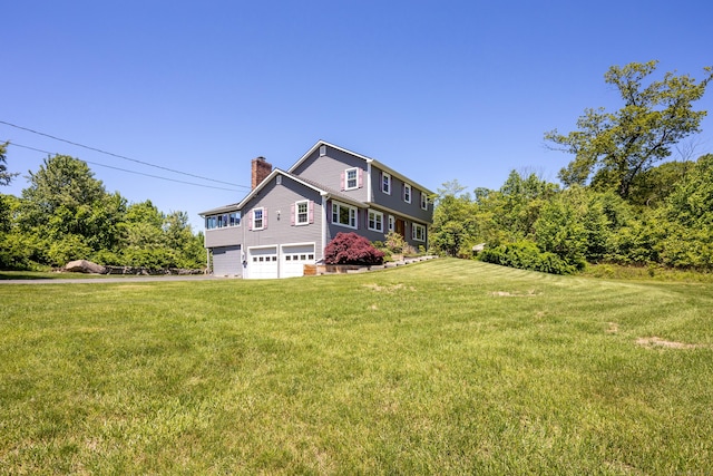 54 Flax Hill Rd, Brookfield, CT 06804 - view of front of property featuring an attached garage, a chimney, and a front lawn