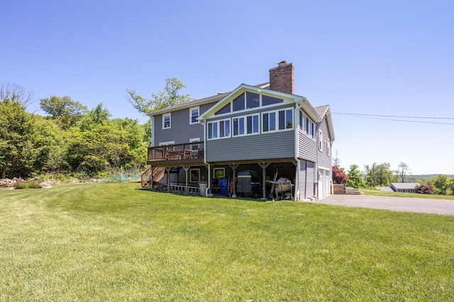 54 Flax Hill Rd, Brookfield, CT 06804 - rear view of property with stairway, driveway, a deck, a yard, and a chimney