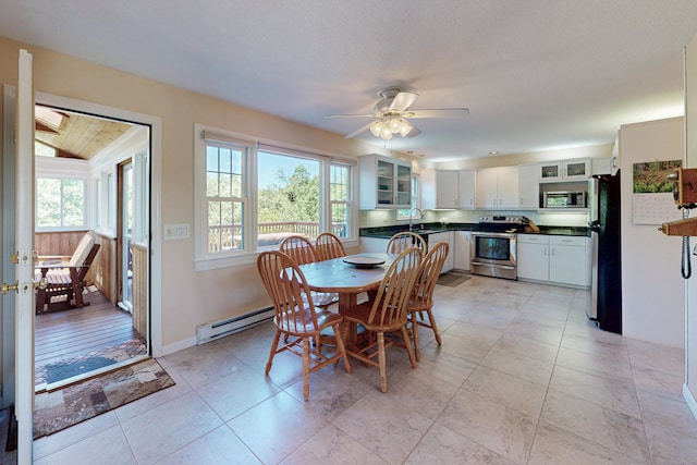 54 Flax Hill Rd, Brookfield, CT 06804 - dining room with a baseboard radiator, ceiling fan, and light tile patterned flooring