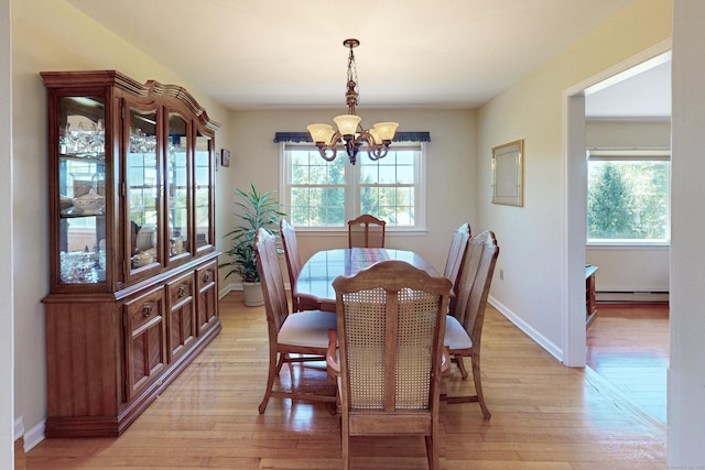 54 Flax Hill Rd, Brookfield, CT 06804 - dining room with a chandelier, a baseboard radiator, light wood-style flooring, and baseboards