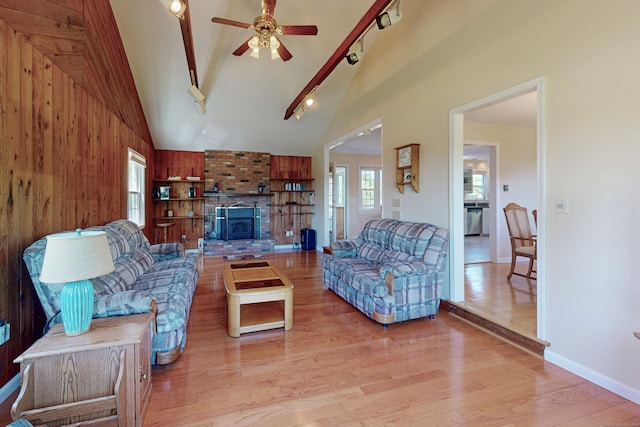 54 Flax Hill Rd, Brookfield, CT 06804 - living room featuring a ceiling fan, light wood finished floors, lofted ceiling, track lighting, and baseboards