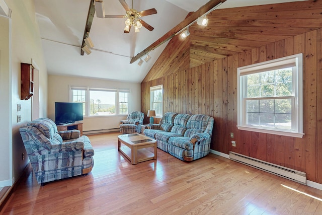 54 Flax Hill Rd, Brookfield, CT 06804 - living area with rail lighting, baseboard heating, wood finished floors, ceiling fan, and wood walls