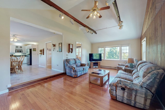 54 Flax Hill Rd, Brookfield, CT 06804 - living room featuring ceiling fan, rail lighting, a baseboard radiator, and light wood-type flooring