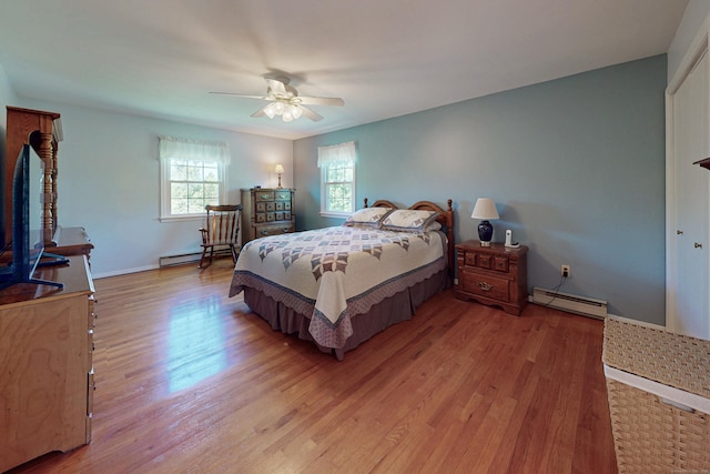 54 Flax Hill Rd, Brookfield, CT 06804 - bedroom featuring a baseboard heating unit, light wood-style floors, baseboard heating, a ceiling fan, and baseboards
