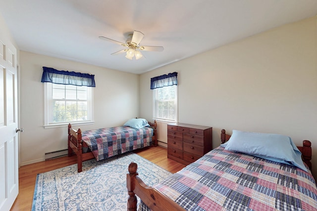 54 Flax Hill Rd, Brookfield, CT 06804 - bedroom featuring light wood-type flooring, a baseboard radiator, ceiling fan, and baseboards