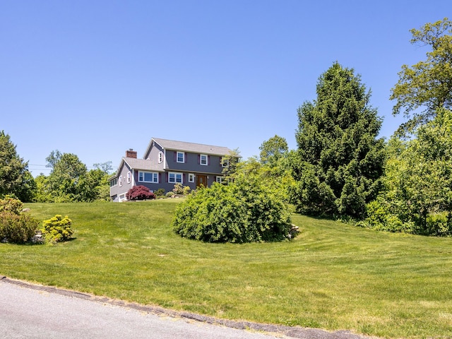 54 Flax Hill Rd, Brookfield, CT 06804 - view of front of property with a front yard and a chimney