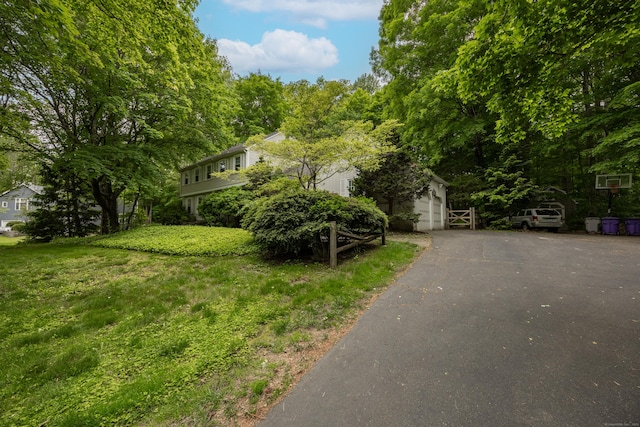 50 Stonehedge Ln S, Guilford, CT 06437 - view of front of property with driveway and a front yard