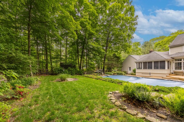 50 Stonehedge Ln S, Guilford, CT 06437 - view of green lawn featuring a sunroom, a covered pool, and a patio