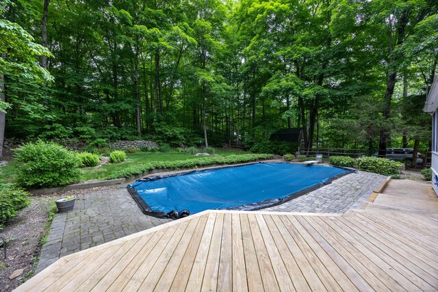 50 Stonehedge Ln S, Guilford, CT 06437 - view of pool with a wooden deck, a covered pool, a diving board, and a patio