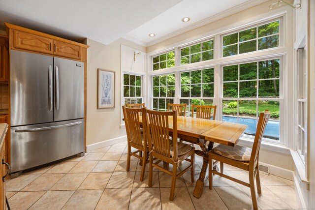 50 Stonehedge Ln S, Guilford, CT 06437 - dining area featuring ornamental molding, baseboards, light tile patterned flooring, healthy amount of natural light, and recessed lighting