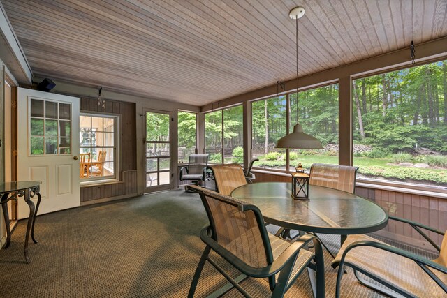 50 Stonehedge Ln S, Guilford, CT 06437 - sunroom / solarium featuring wood ceiling, outdoor dining area, carpet, and wood walls