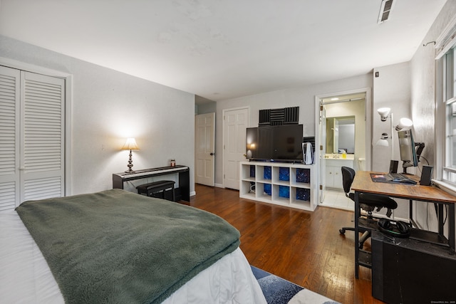 50 Stonehedge Ln S, Guilford, CT 06437 - bedroom with a desk, wood finished floors, and ensuite bath