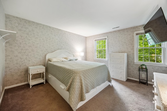 50 Stonehedge Ln S, Guilford, CT 06437 - bedroom featuring multiple windows, wallpapered walls, baseboards, and carpet flooring