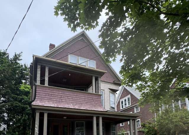 96 Hubinger St, New Haven, CT 06511 - view of home's exterior with a chimney