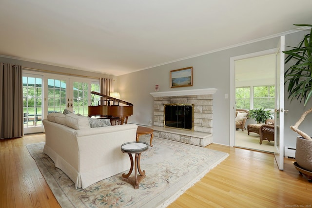 33 Preston Rd, Trumbull, CT 06611 - living room with light wood-type flooring, plenty of natural light, a fireplace, and ornamental molding
