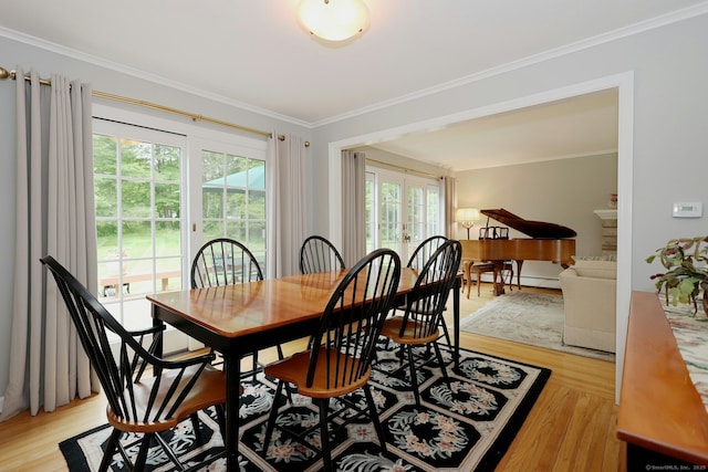 33 Preston Rd, Trumbull, CT 06611 - dining room with ornamental molding, light wood-style flooring, and a baseboard radiator