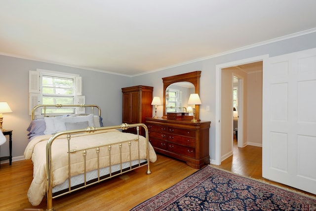33 Preston Rd, Trumbull, CT 06611 - bedroom with light wood-type flooring, crown molding, and baseboards