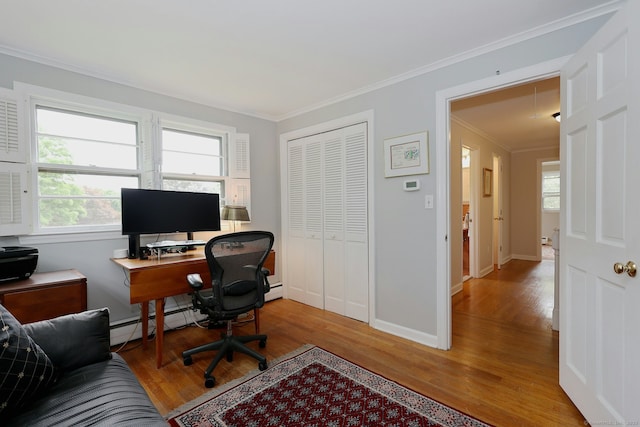 33 Preston Rd, Trumbull, CT 06611 - office area featuring a baseboard heating unit, wood finished floors, ornamental molding, and plenty of natural light
