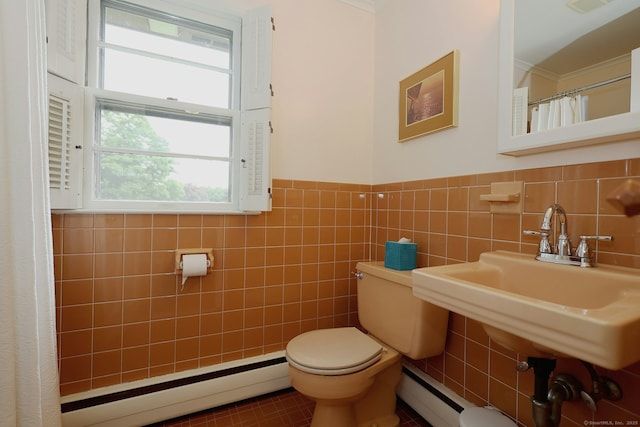 33 Preston Rd, Trumbull, CT 06611 - bathroom featuring baseboard heating, a baseboard heating unit, toilet, wainscoting, and tile walls