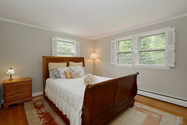 33 Preston Rd, Trumbull, CT 06611 - bedroom featuring light wood finished floors, a baseboard radiator, and ornamental molding
