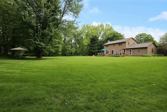 33 Preston Rd, Trumbull, CT 06611 - view of green lawn with a wooden deck