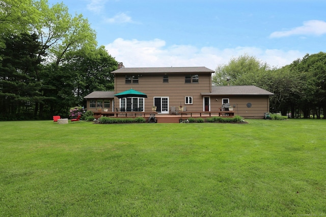33 Preston Rd, Trumbull, CT 06611 - rear view of property with a deck, a lawn, and a chimney