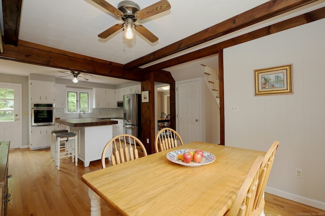 33 Preston Rd, Trumbull, CT 06611 - dining space with a ceiling fan, beam ceiling, light wood-type flooring, stairs, and baseboards