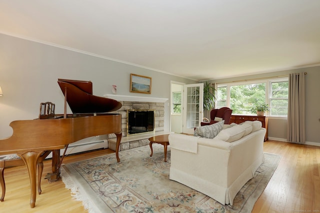 33 Preston Rd, Trumbull, CT 06611 - living area featuring ornamental molding, light wood-type flooring, a fireplace, and baseboards