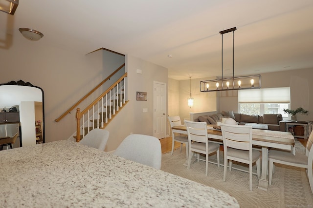 23 Riverview Ct Unit 23, Brookfield, CT 06804 - dining space featuring stairway and light wood finished floors