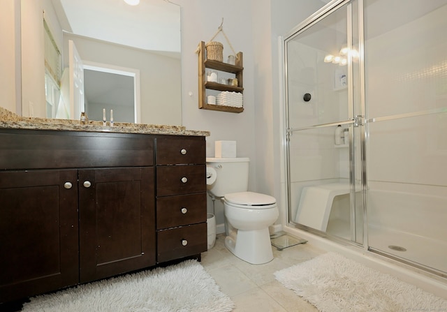 23 Riverview Ct Unit 23, Brookfield, CT 06804 - full bath featuring a shower stall, toilet, vanity, and tile patterned floors