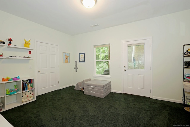 23 Riverview Ct Unit 23, Brookfield, CT 06804 - entrance foyer featuring dark colored carpet and baseboards