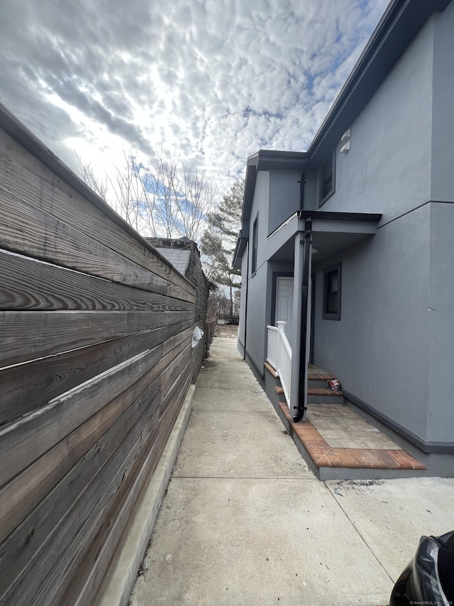 49 Hill St, Waterbury, CT 06704 - view of home's exterior featuring stucco siding