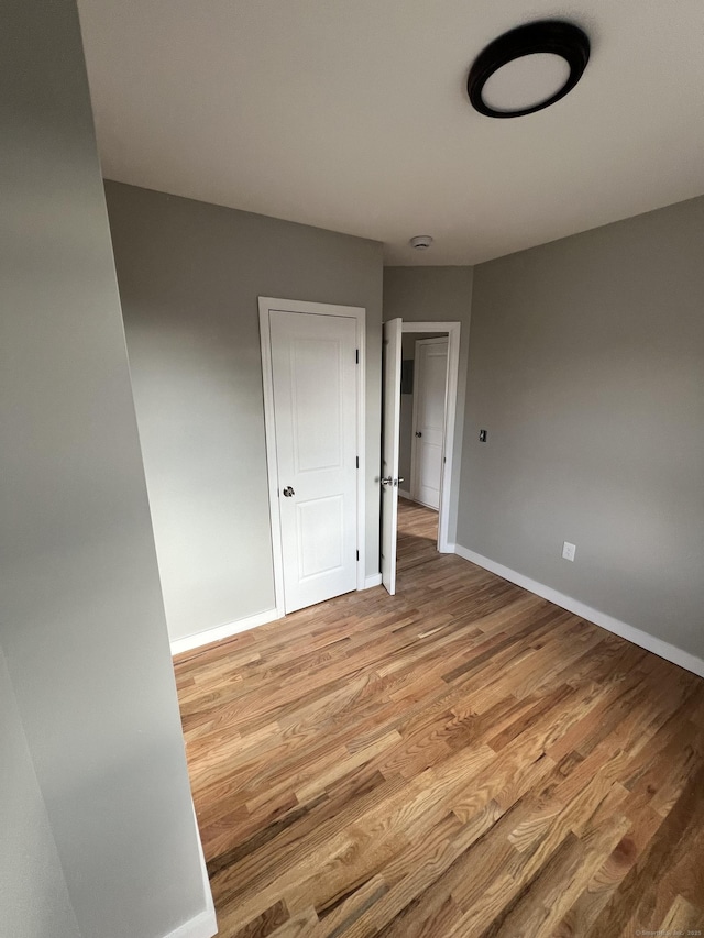 49 Hill St, Waterbury, CT 06704 - spare room with baseboards and light wood finished floors